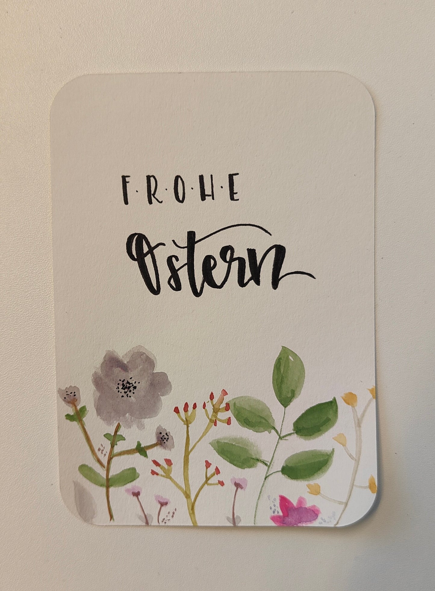 Handgemachte Osterkarte „Frohe Ostern“ mit floralem Aquarell-Design