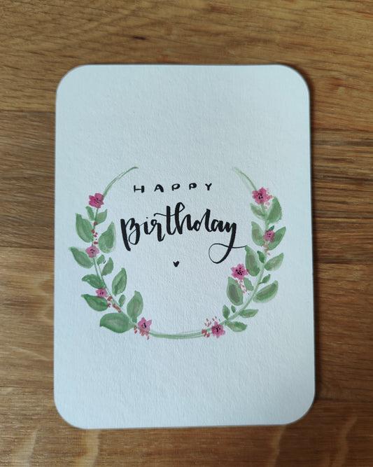 Happy Birthday Karte mit floralem Kranz – handgemalte Geburtstagskarte im Aquarellstil